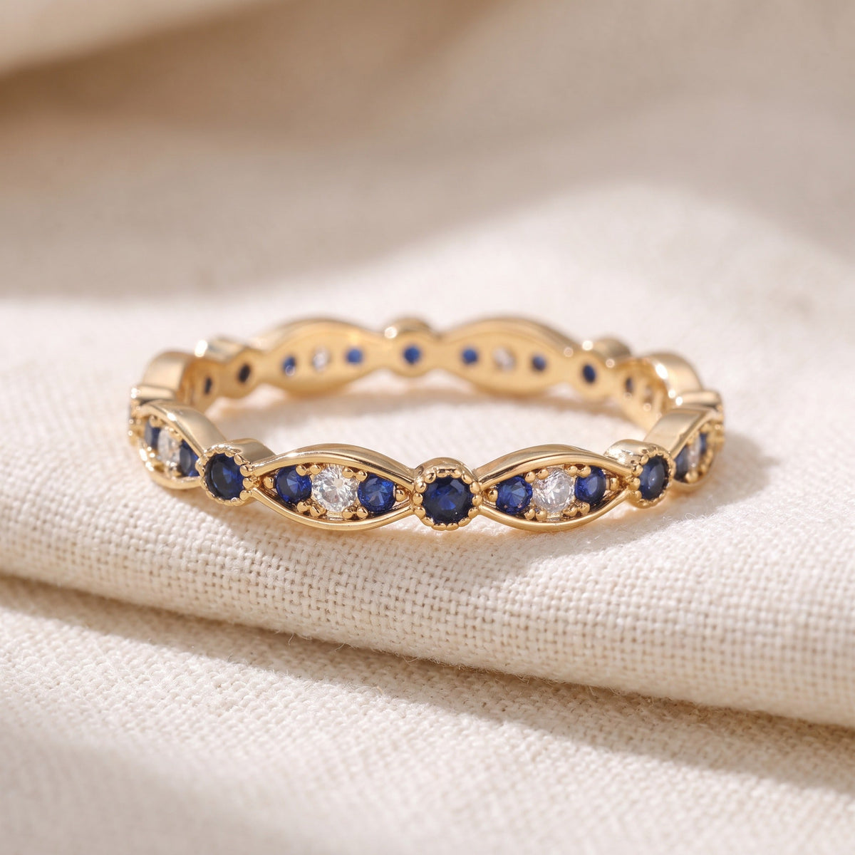 Oval Sapphire & Zirconia Eternity Band Ring in Gold-Tone Plating — main image