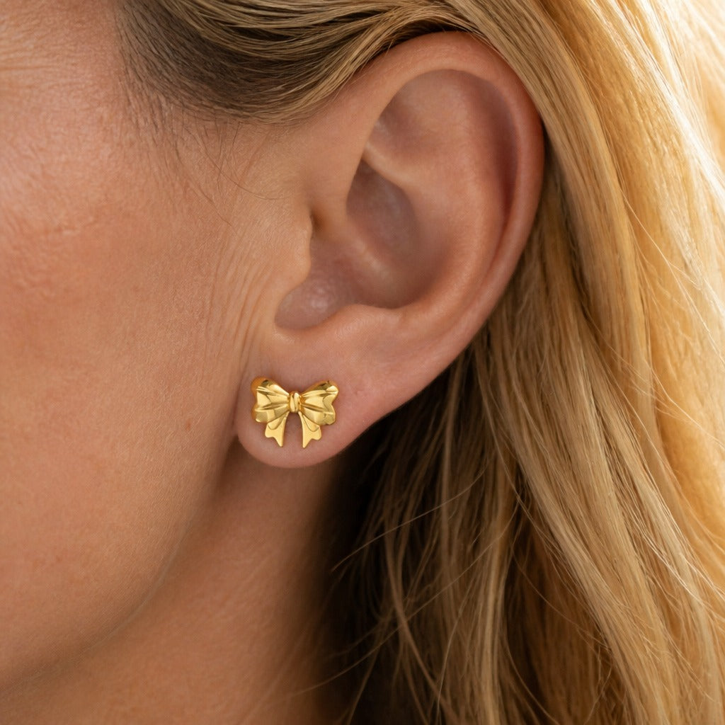 Petite Bow Stud Earrings in Gold-Tone Stainless Steel with Secure Post — main image