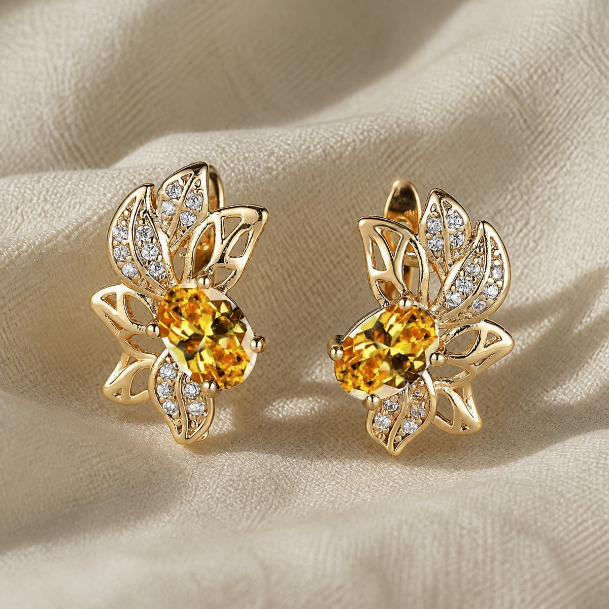 Golden Leaf Stud Earrings with Cubic Zirconia Accents and KC Gold Plating — main image