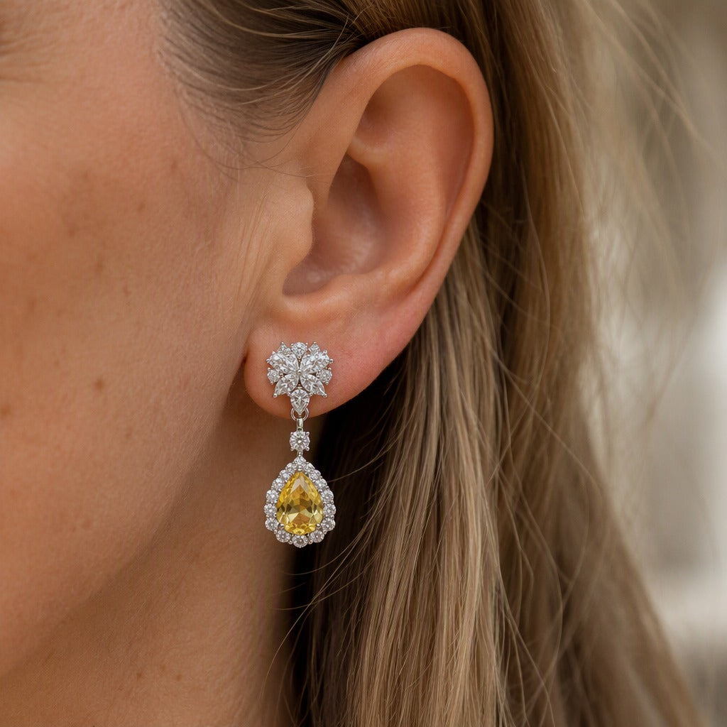 Teardrop Yellow Garnet Earrings with Halo Cluster Detail — main image