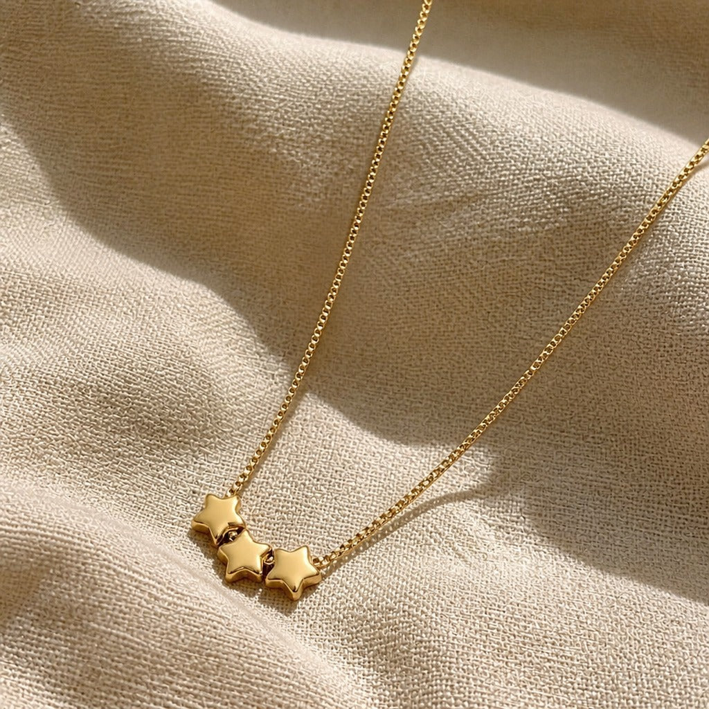Triple Star Gold-Tone Pendant Necklace with Delicate Chain for Everyday Layering — view 2
