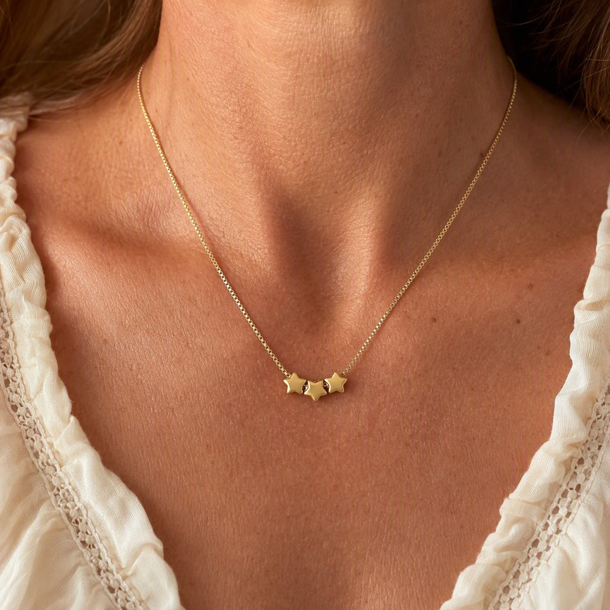 Triple Star Gold-Tone Pendant Necklace with Delicate Chain for Everyday Layering — main image