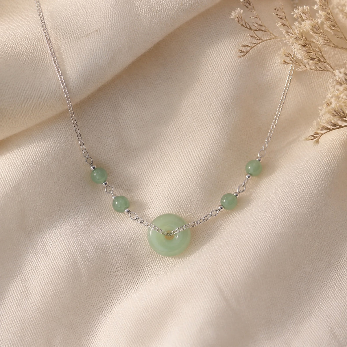 Jade Donut Pendant Necklace with Round Bead Accents — main image