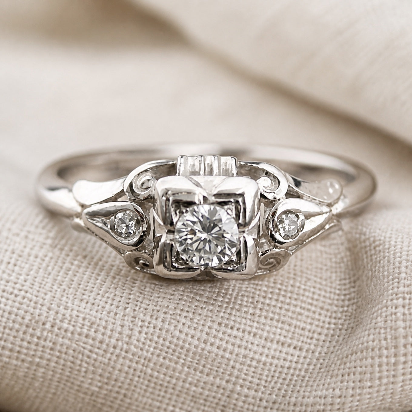 Vintage Art Deco Three-Stone Cubic Zirconia Ring with Silver-Tone Scrollwork