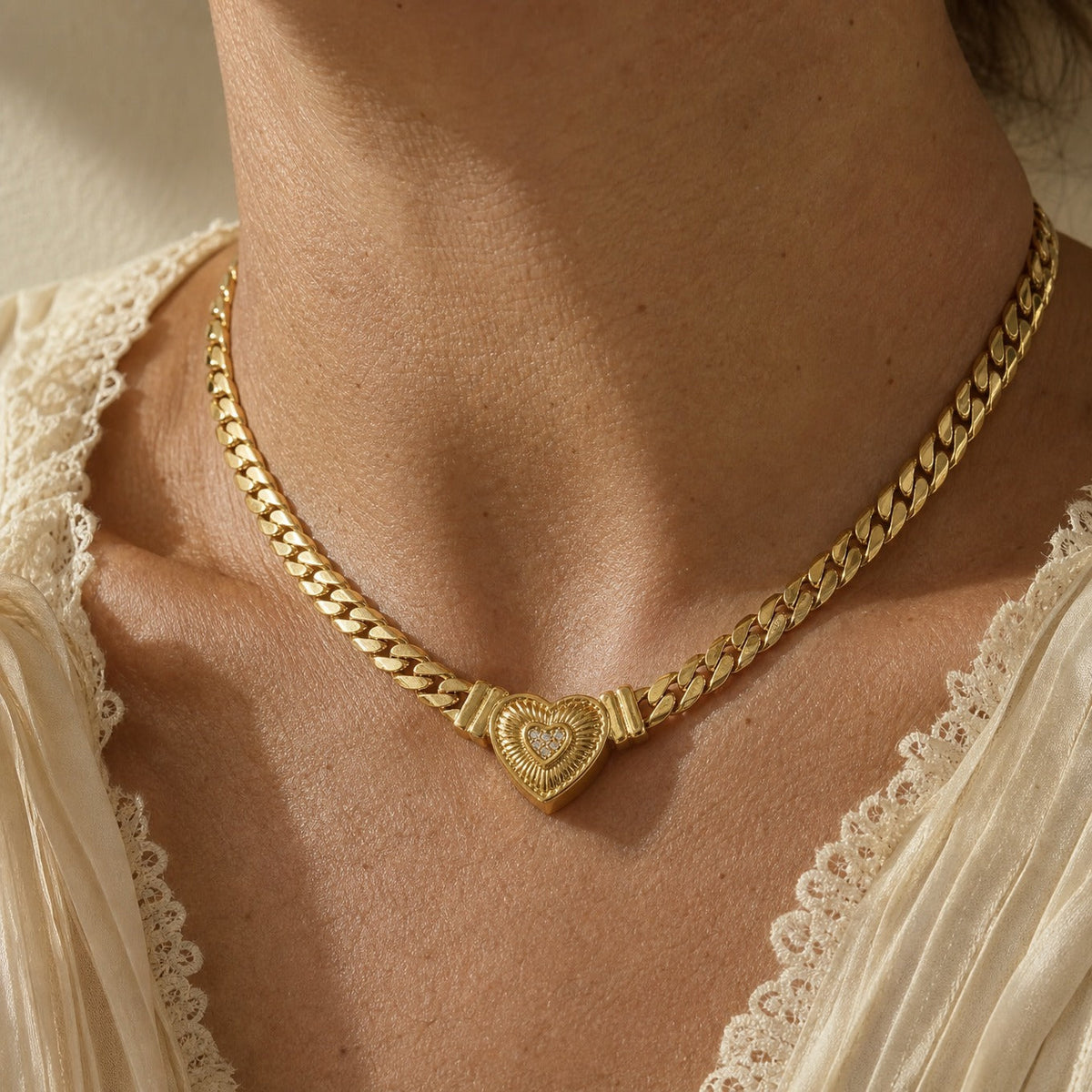 Heart-Shaped Cubic Zirconia Pendant Necklace with Gold-Tone Curb Chain — main image