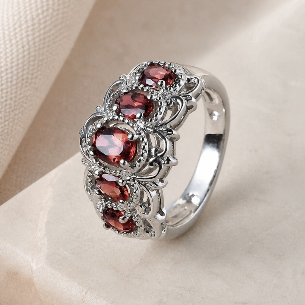 Red Zirconia Scrollwork Ring with Hollow Silver-Tone Band — main image
