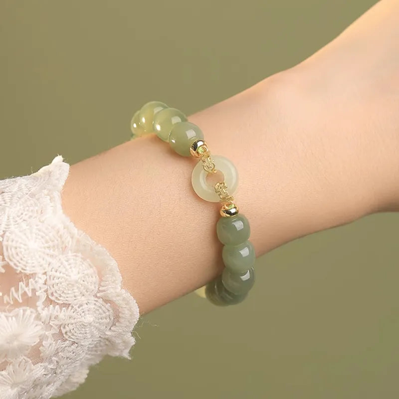 Round Jade Beaded Bracelet with Gold-Tone Spacer Beads and Accent Stone — view 2