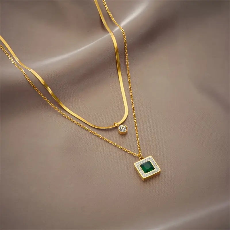 Layered Necklace with Square Emerald-Green Stone and Round Clear Stone Pendants in Gold Tone — view 3