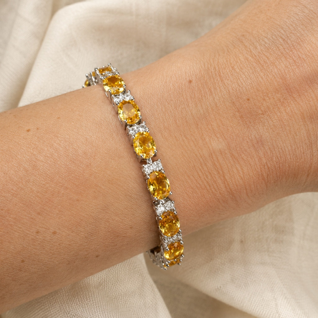 Oval Yellow Cubic Zirconia Tennis Bracelet with White Accent Stones — main image