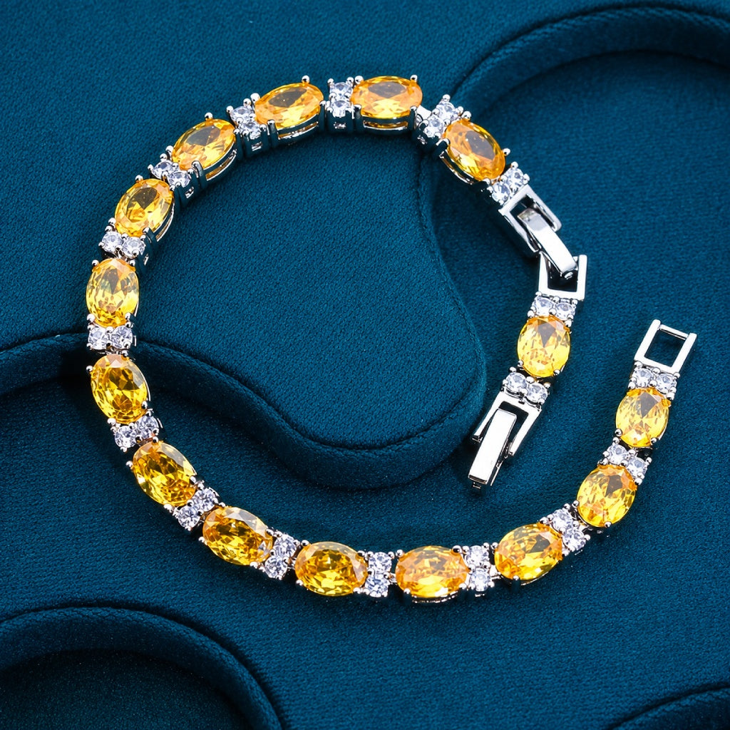 Oval Yellow Cubic Zirconia Tennis Bracelet with White Accent Stones — view 2
