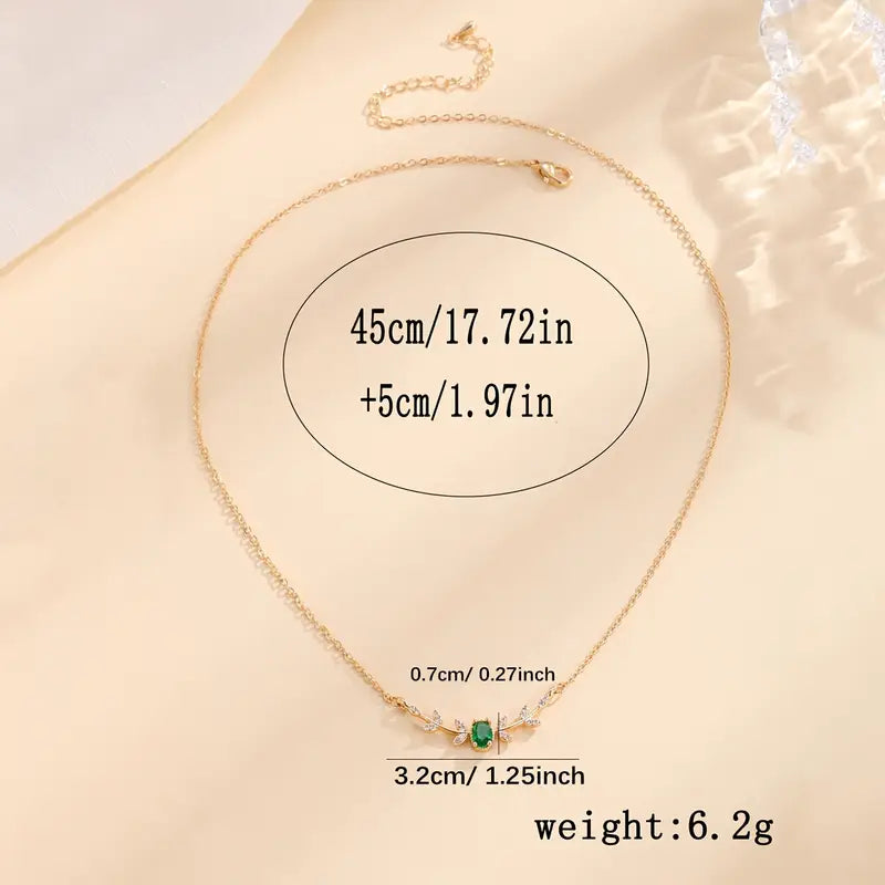 Oval Emerald Pendant Necklace with Floral Accent Stones, Gold-Tone Cable Chain