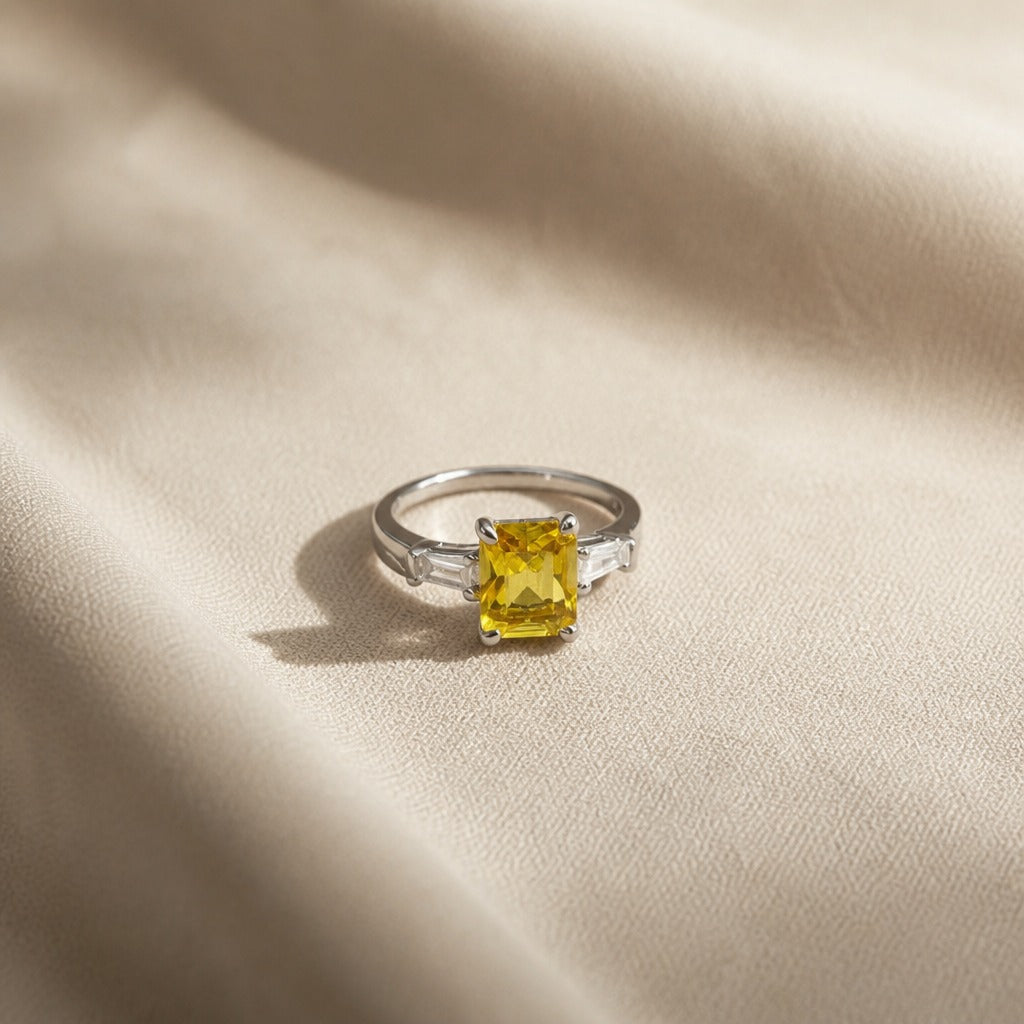 Yellow Cushion-Cut Three-Stone Ring with Clear Baguette Accents — main image
