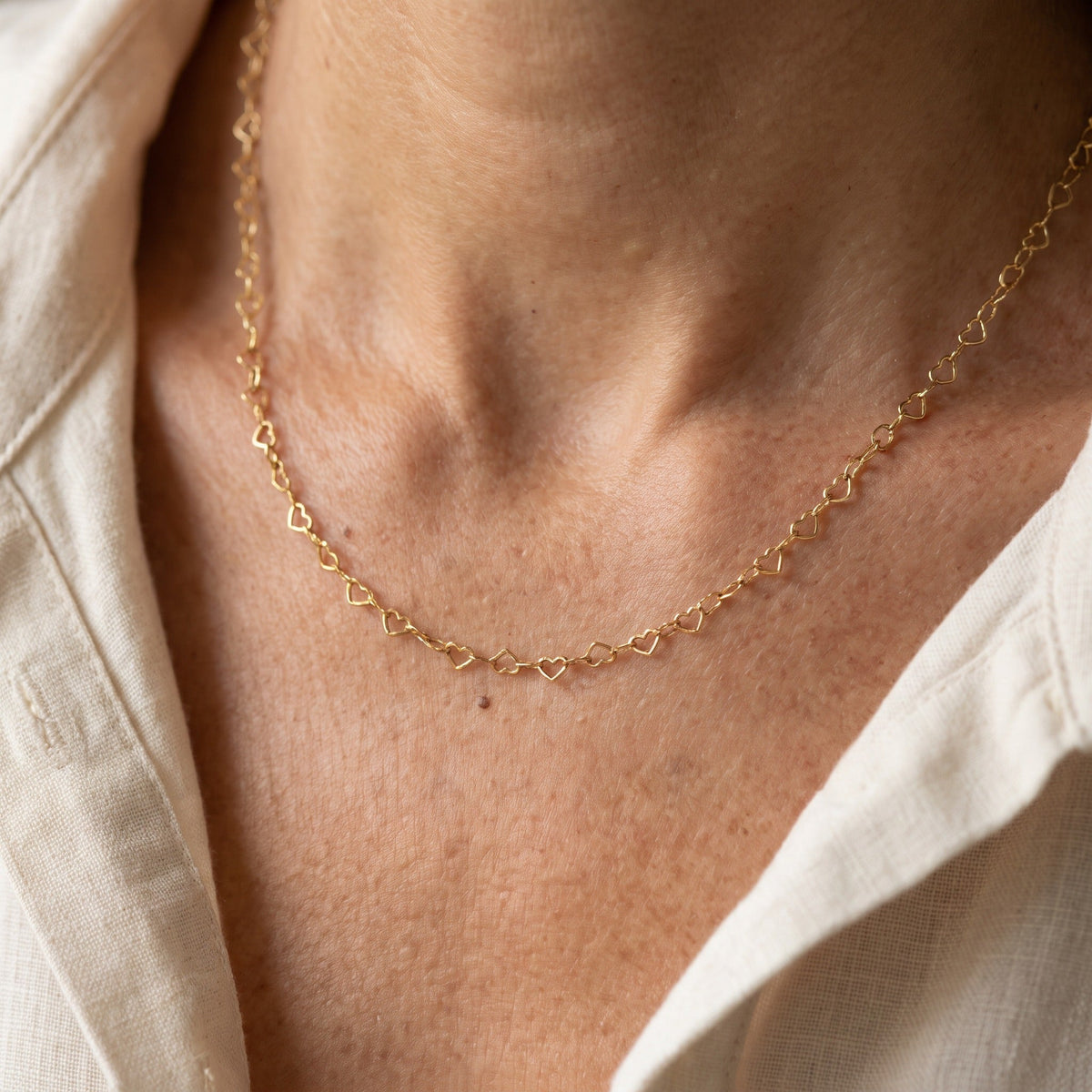 Hollow Heart Pendant Necklace in Gold-Tone with Heart-Link Chain — main image