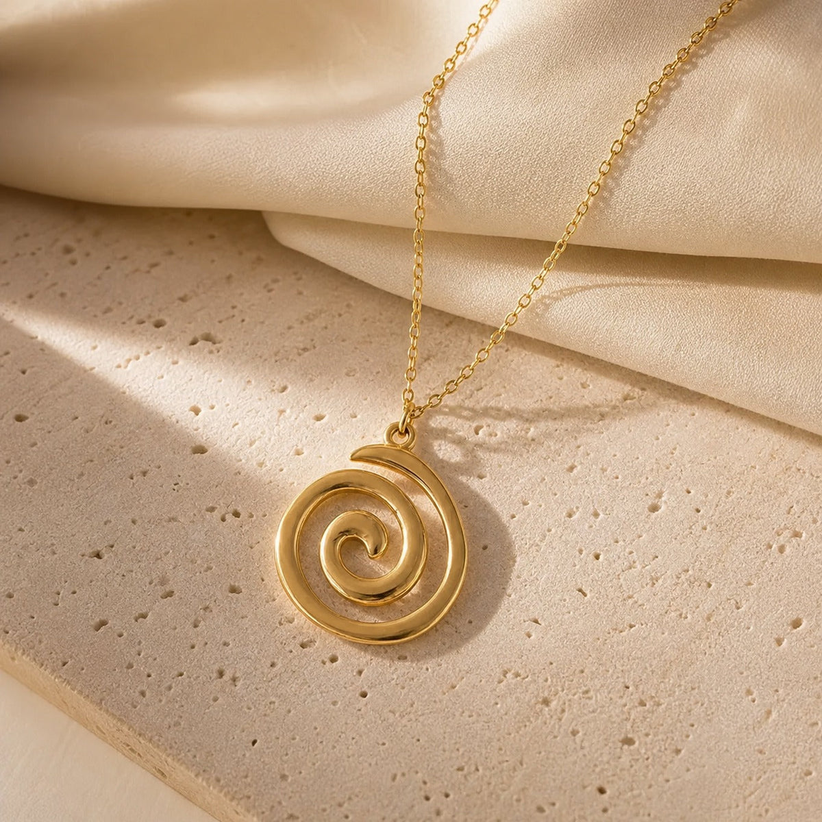 Spiral Pendant Necklace with Concentric Circle Design in Gold Tone — main image