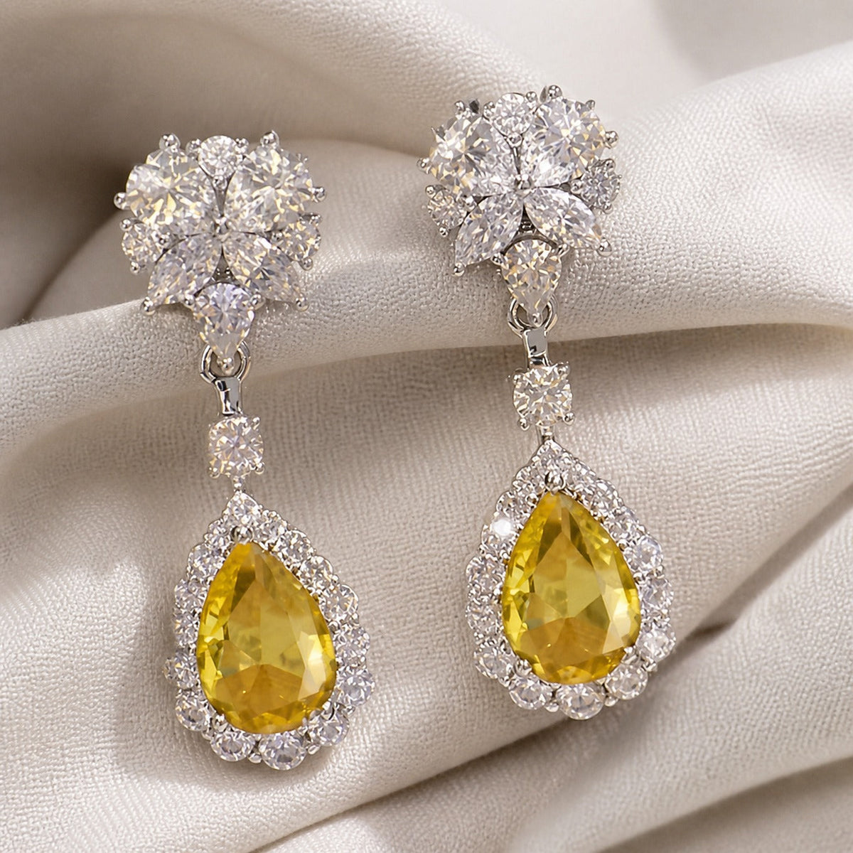 Teardrop Yellow Garnet Earrings with Halo Cluster Detail — view 2