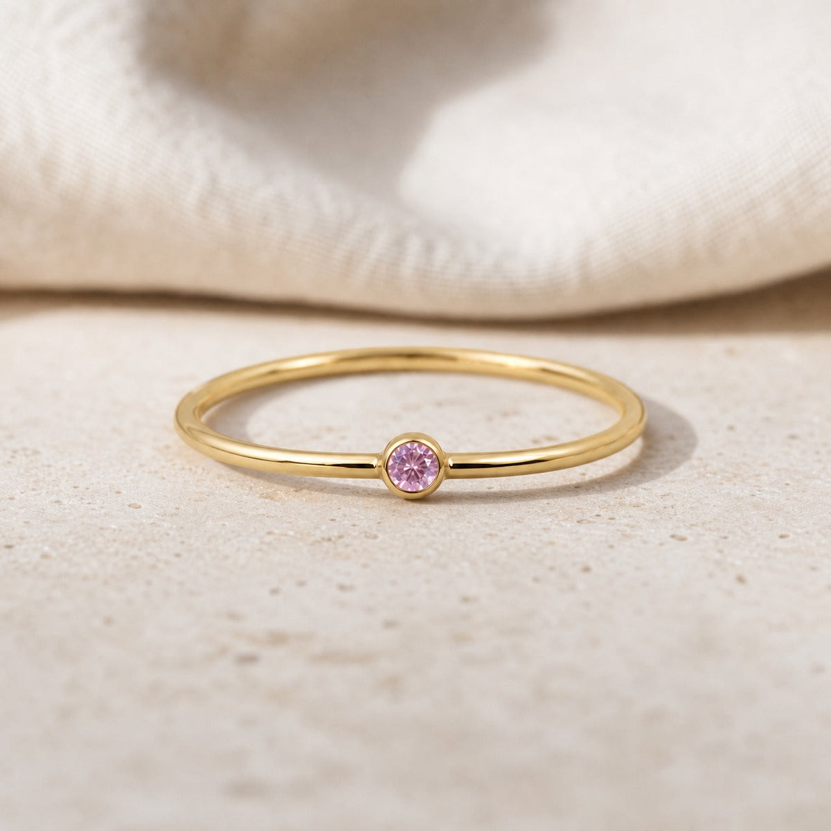 Round Lavender Stone Solitaire Ring with Bezel Setting and Gold Band — main image