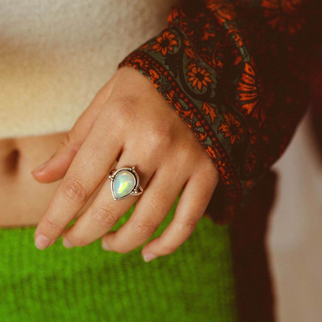 Teardrop Opal Ring with Silver Bezel Setting and Split Band