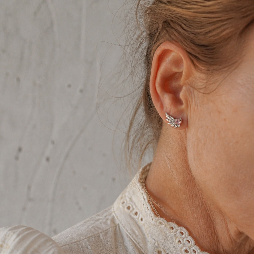 Heart-Shaped Pink Stone Angel Wing Stud Earrings in Silver Tone — main image