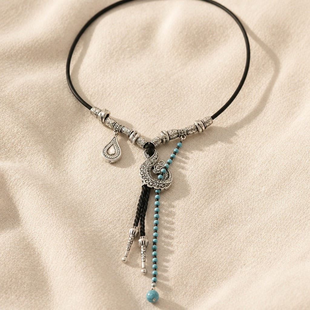Turquoise Bead Pendant Necklace with Black Tassel and Filigree Detail — main image