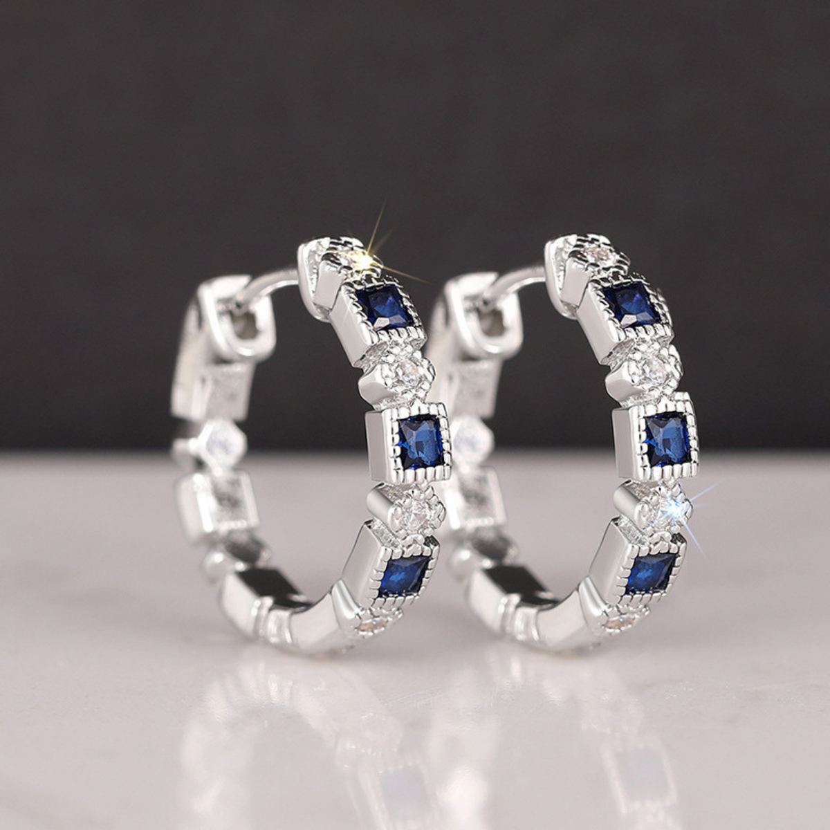 Geometric Blue Zircon Hoop Earrings with Clear Accent Stones — main image