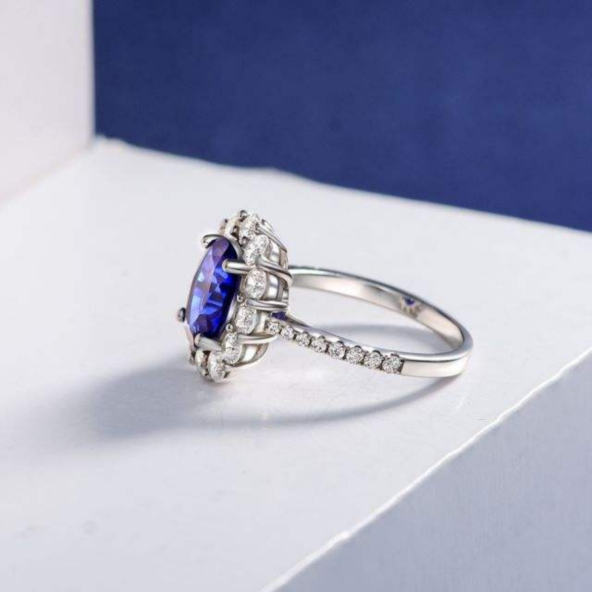 Oval Blue Sapphire Halo Ring with Pavé Cubic Zirconia Band — view 4