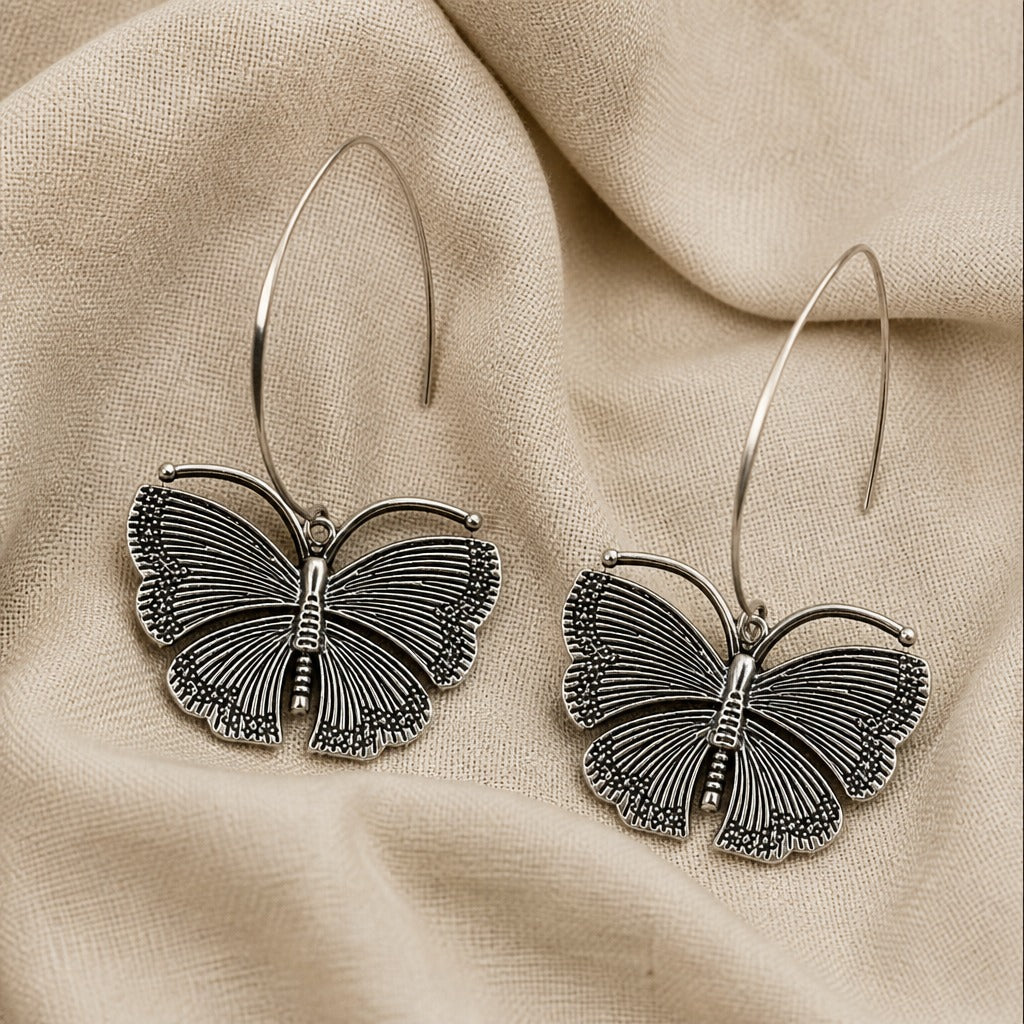 Carved Butterfly Drop Hoop Earrings in Silver Tone — view 2