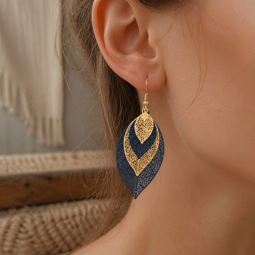 Hollow Layered Leaf Drop Earrings with Gold-Tone Filigree Design — main image
