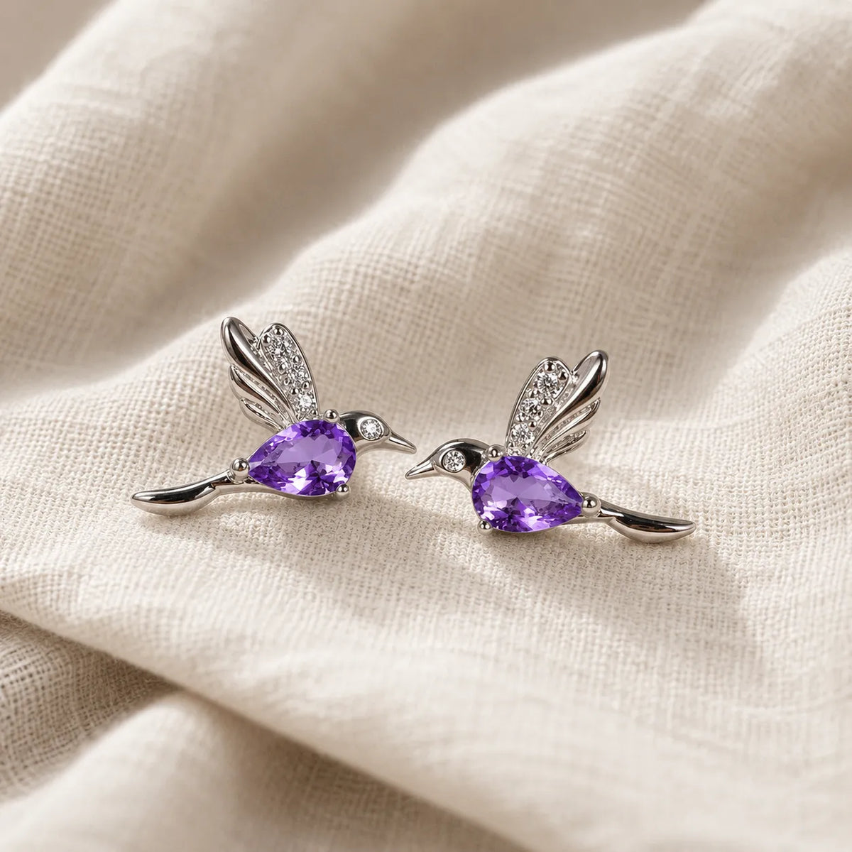 Hummingbird Amethyst Stud Earrings with Sparkling Wing Accents
