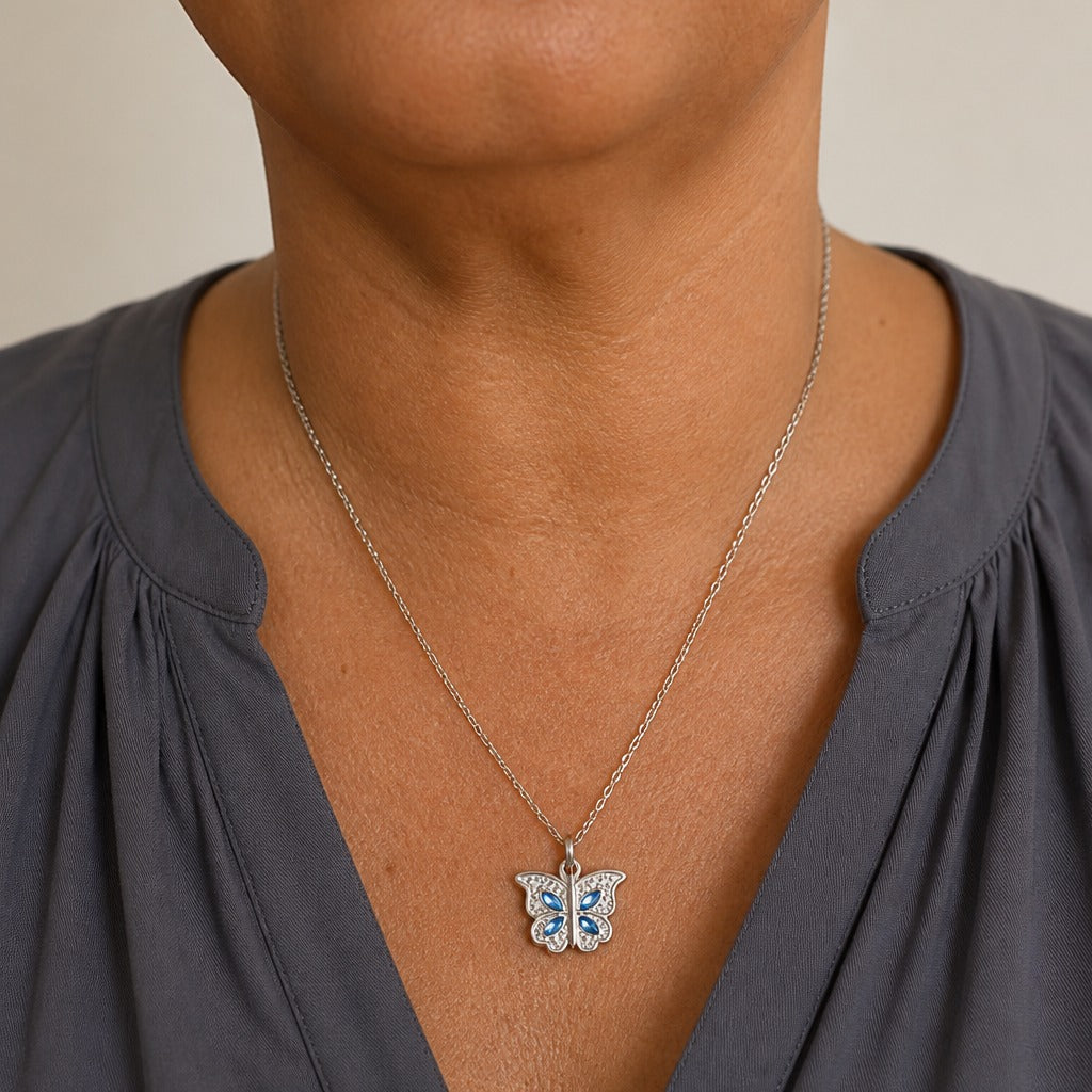 Butterfly Locket Pendant Necklace with Blue Stone Accents — main image
