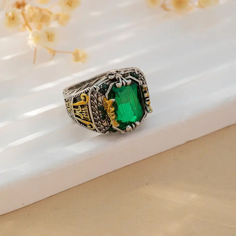 Rectangular Emerald Ring with Ornate Carved Band in Mixed Metal Tones
