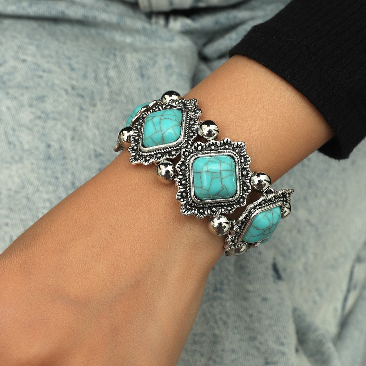 Turquoise Cushion-Cut Bracelet with Winged Filigree Charms