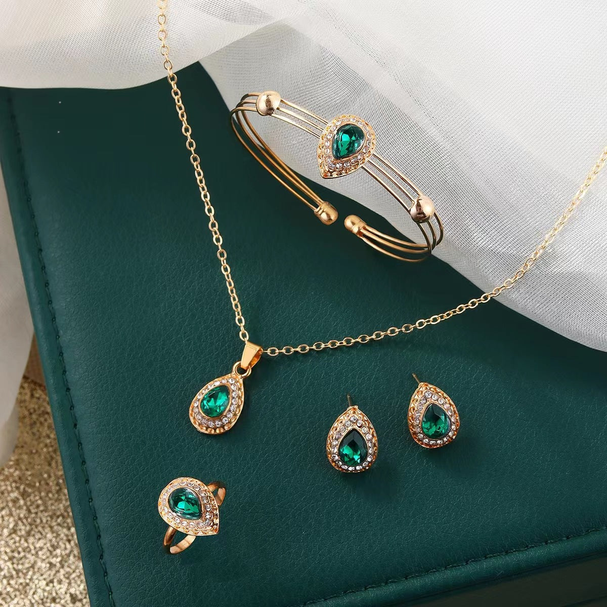 Teardrop Emerald Green Jewelry Set with Crystal Halo Accents – Necklace, Earrings, Ring & Bracelet