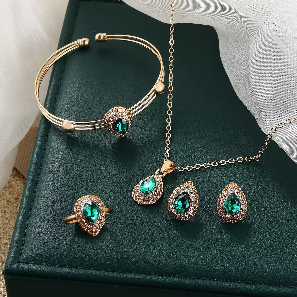 Teardrop Emerald Green Jewelry Set with Crystal Halo Accents – Necklace, Earrings, Ring & Bracelet