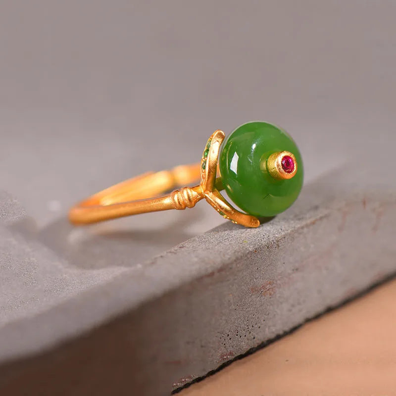 Domed Jade Cabochon Ring with Pink Accent Stone and Gold-Tone Band — view 3