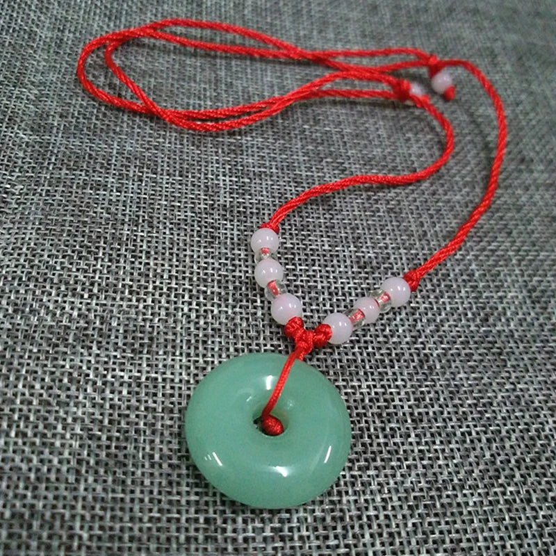 Green Jade Disc Pendant Necklace with Red Cord and Beaded Accents — view 2
