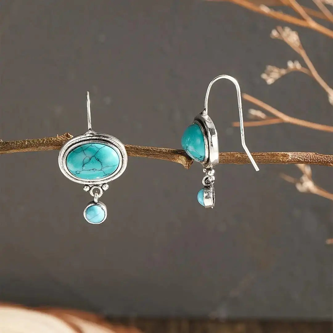 Oval Turquoise Drop Earrings with Silver Bloom Detail and Round Stone Accent — view 2