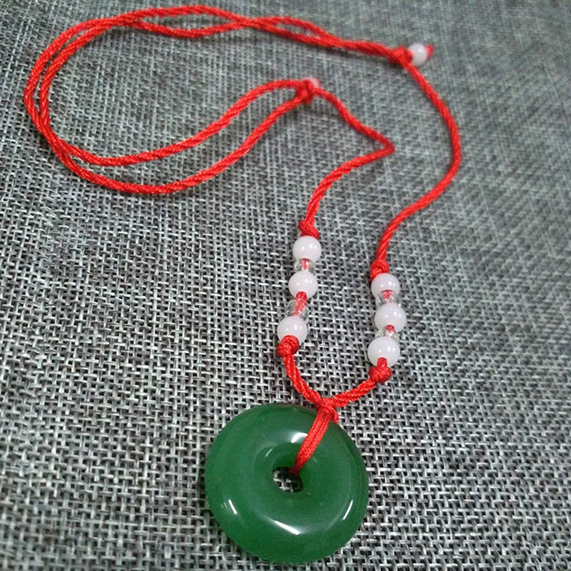 Green Jade Disc Pendant Necklace with Red Cord and Beaded Accents — main image