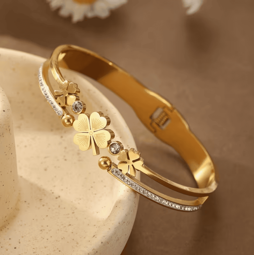 Four-Leaf Clover Bangle Bracelet with Rhinestone Accents and Hinged Clasp — main image