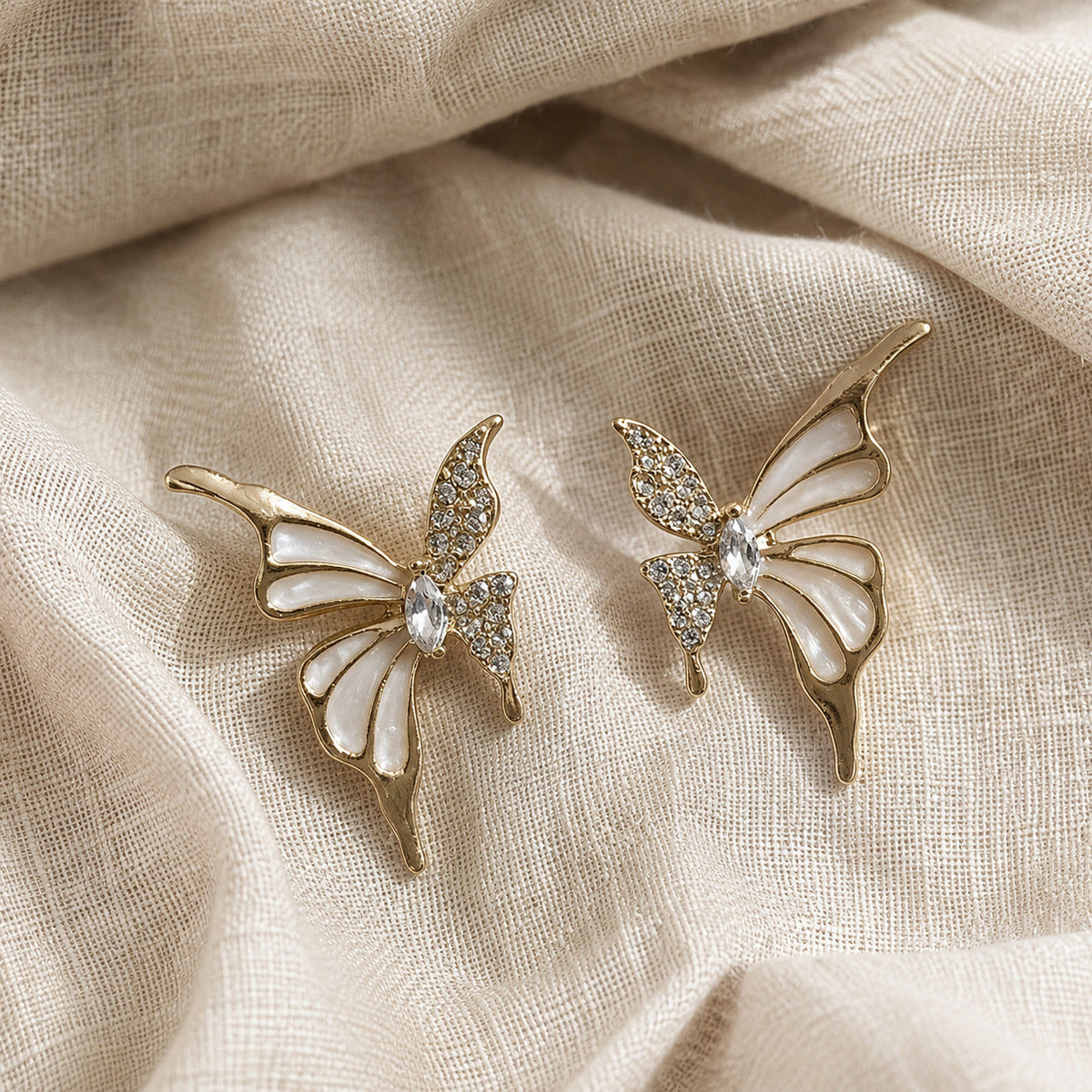 Butterfly Crystal Stud Earrings in Gold Tone with White Enamel Wings — view 2