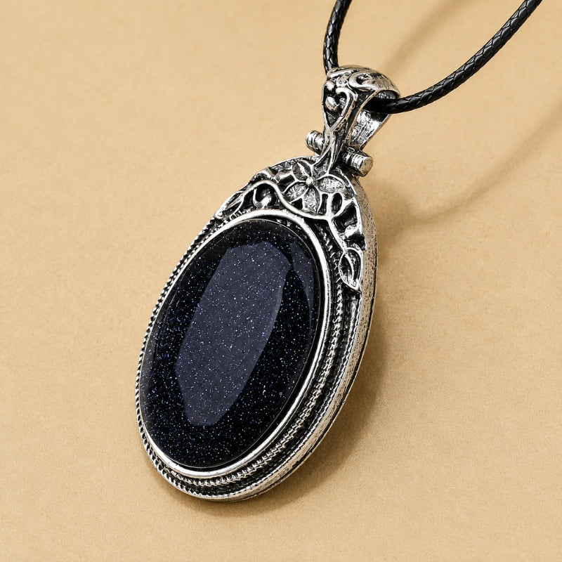 Oval Black Stone Pendant Necklace with Silver-Tone Filigree Setting — view 2