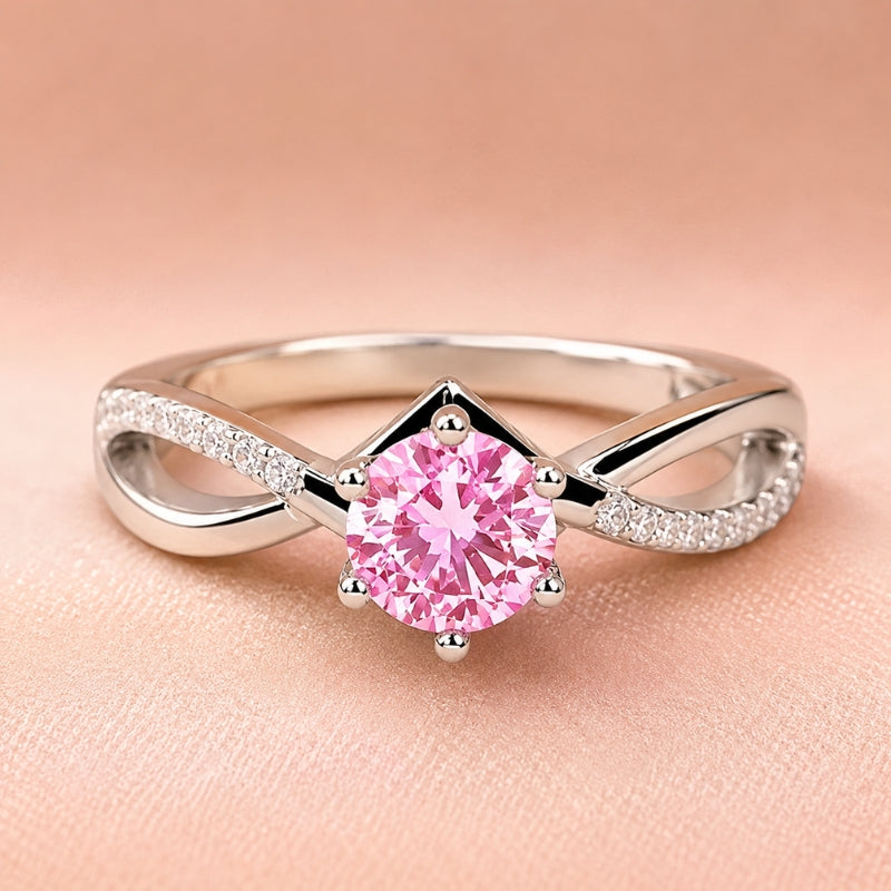 Round Pink Cubic Zirconia Ring with Twisted Band and Accent Stones — main image
