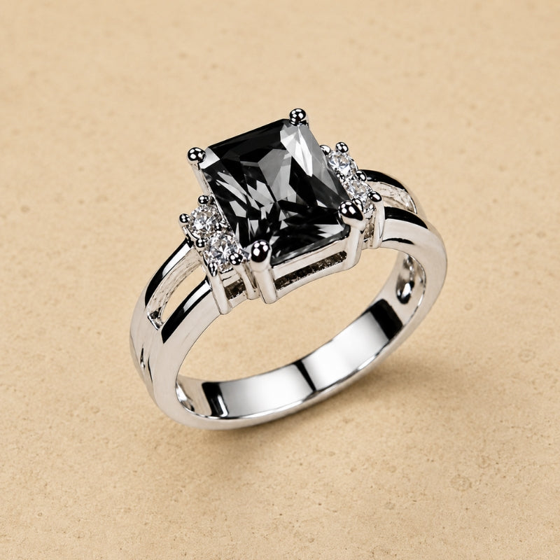 Emerald-Cut Black Stone Cocktail Ring with Clear Accent Stones and Silver-Tone Band — main image