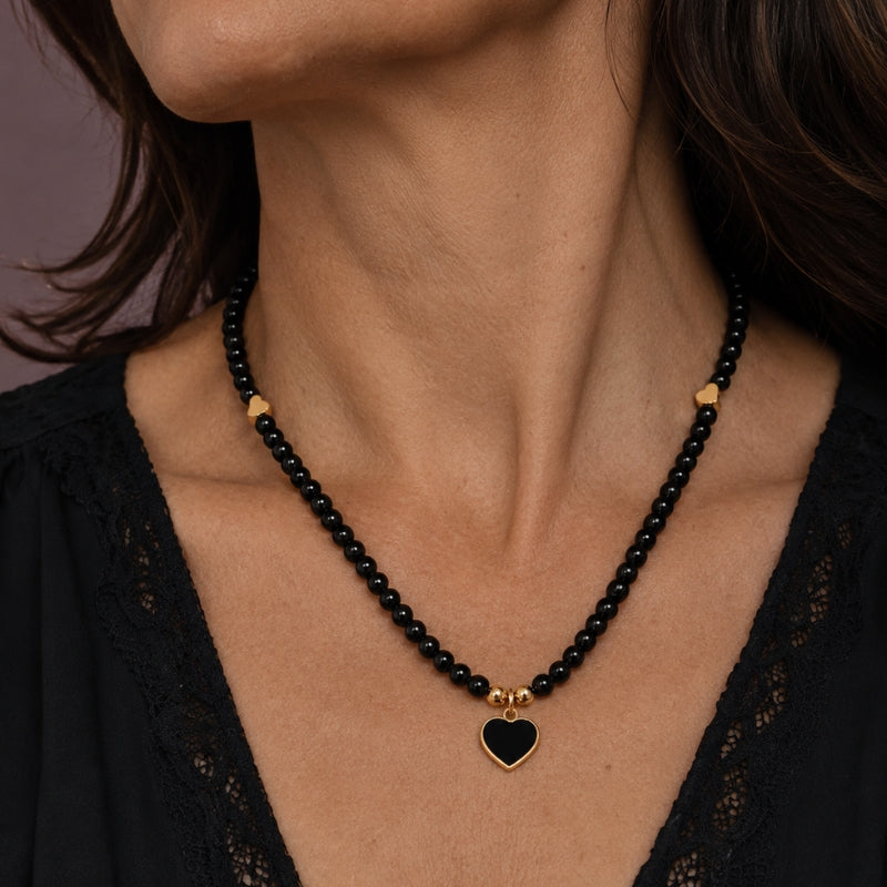 Black Heart Pendant Beaded Necklace with Gold-Tone Accents — main image