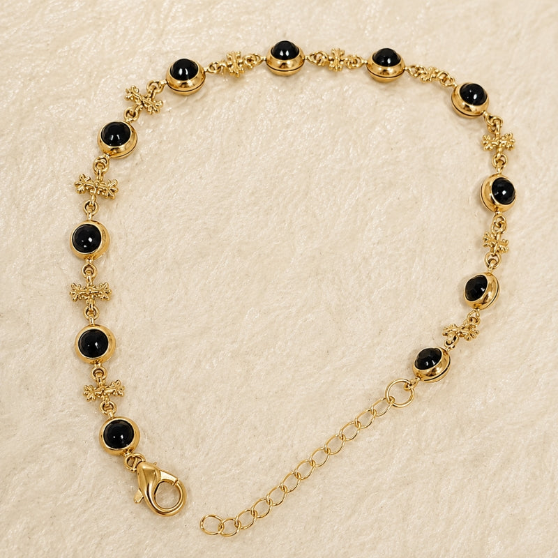 Gold-Tone Beaded Charm Bracelet with Black Cabochon Stones and Filigree Spacers — main image