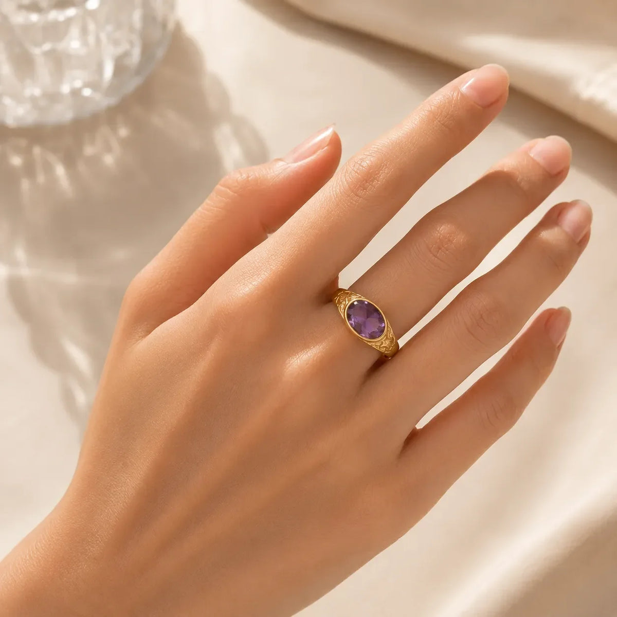 Oval Amethyst Signet Ring with Gold Scrollwork Detail