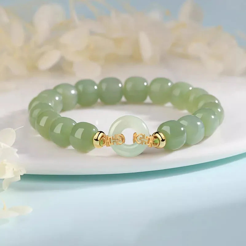 Round Jade Beaded Bracelet with Gold-Tone Spacer Beads and Accent Stone — main image
