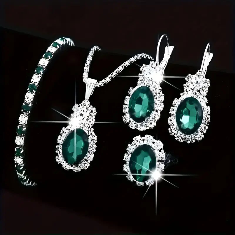 Oval Emerald Halo Jewelry Set with Necklace, Earrings, Bracelet & Ring