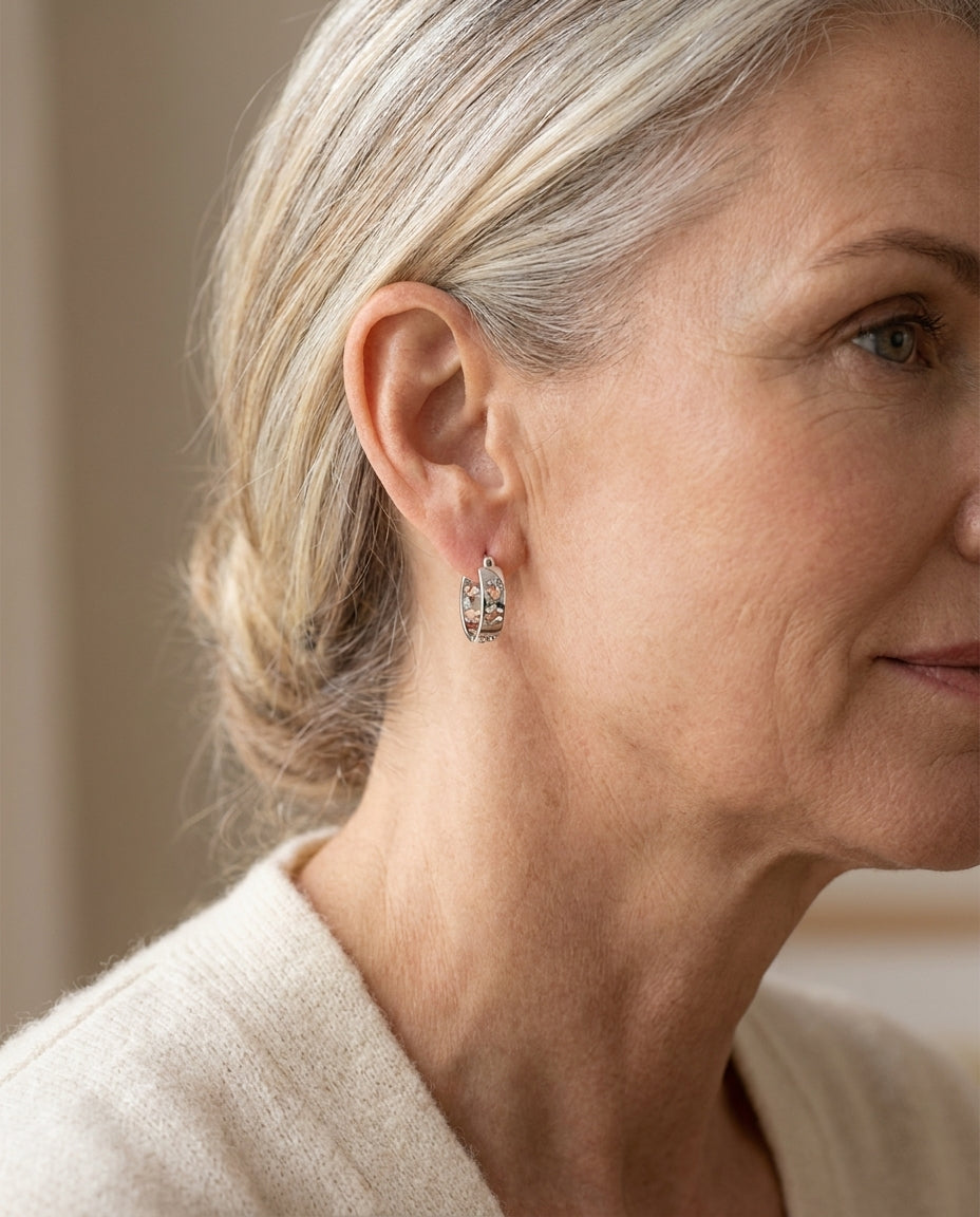 Estelle & Ruby Paw Print Hoop Earrings – Copper, White Gold Plated, Hinged, 20mm (AI-generated lifestyle image)