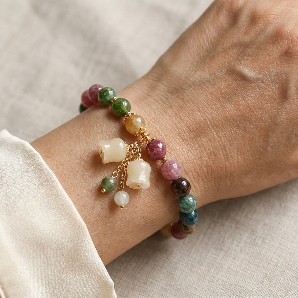 bohemian multicolor gemstone bracelet beaded tassel pendant hand chain with golden spacers elegant colorful jewelry gift for women daily party wear — lifestyle
