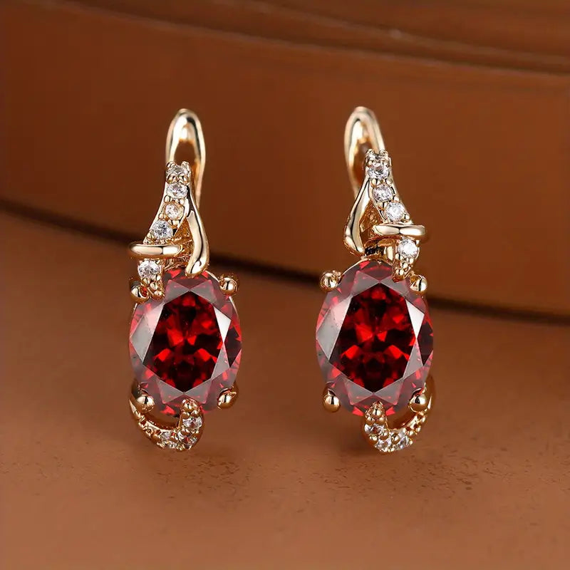 Oval Ruby Drop Earrings with Scrollwork Detail and Sparkling Accents — main image